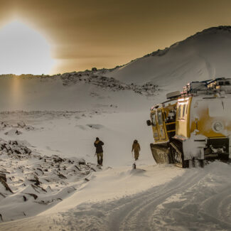 Researches walking in Antarctica