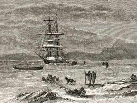A black and white illustration shows a large sailing ship trapped in icy water, with smaller boats, sleds pulled by people and a dog, and figures on the ice.