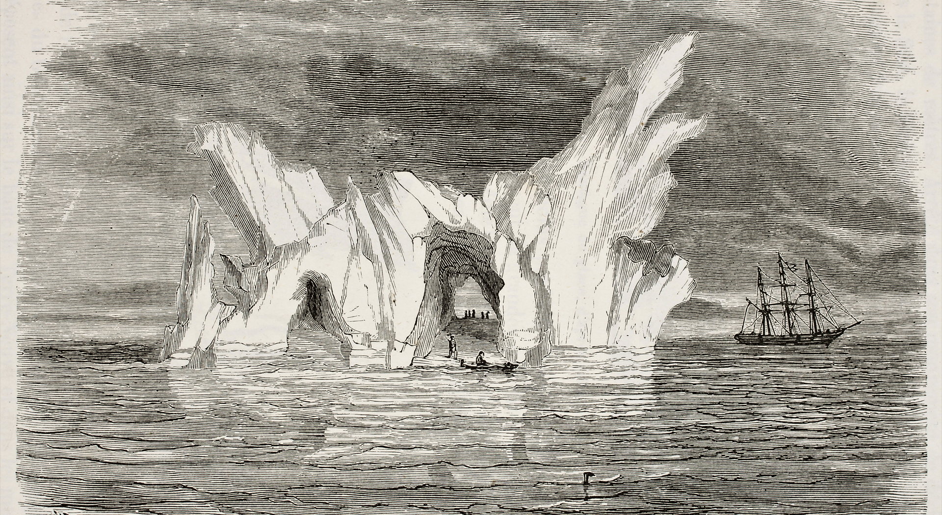 Black and white illustration of a large, arched iceberg with small boats and figures near openings, and a sailing ship in the distance on a wavy sea under a cloudy sky.
